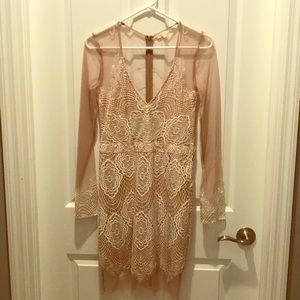 Beautiful lined dress. White lined with tan.